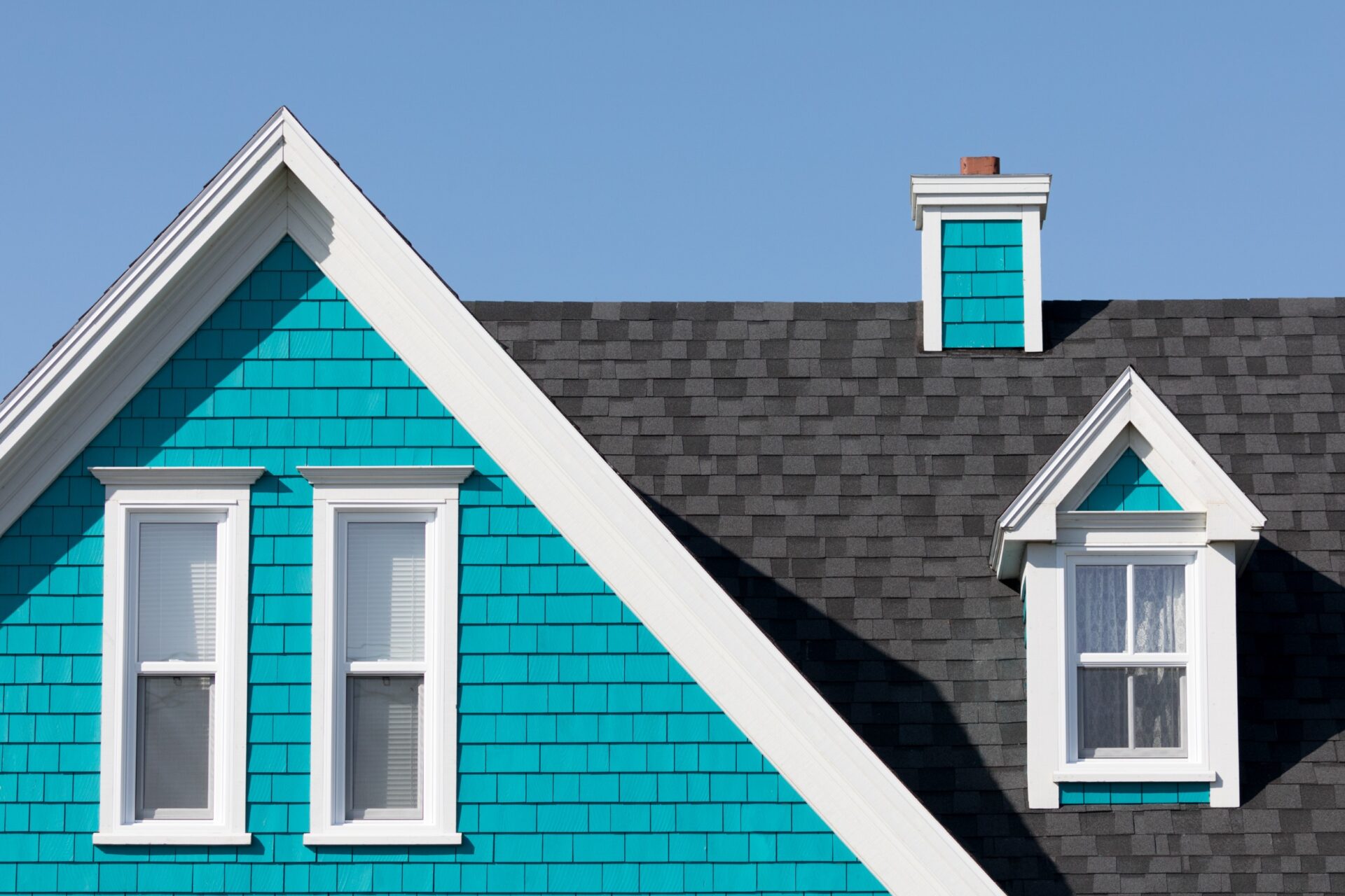 exterior of a roof on a blue house